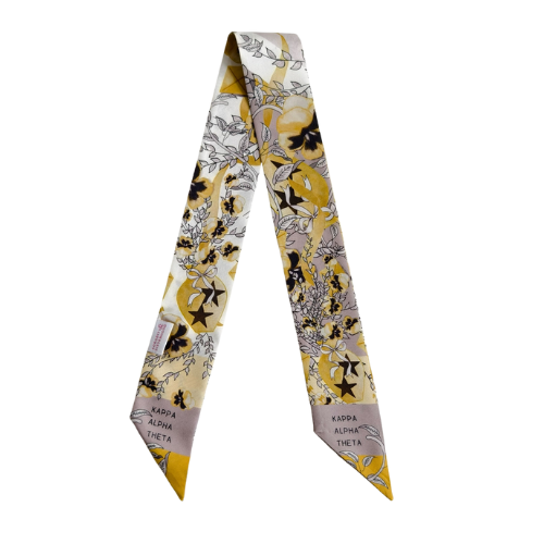 Silk scarflette with yellow, black, and gray floral design and Kappa Alpha Theta text on beige ends.