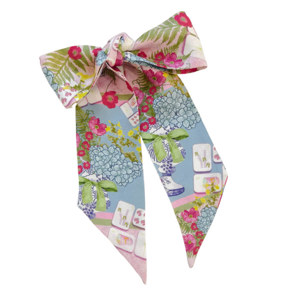 Silk scarflette with Mahjong tiles and floral patterns in pink, green, blue, and cream colors.