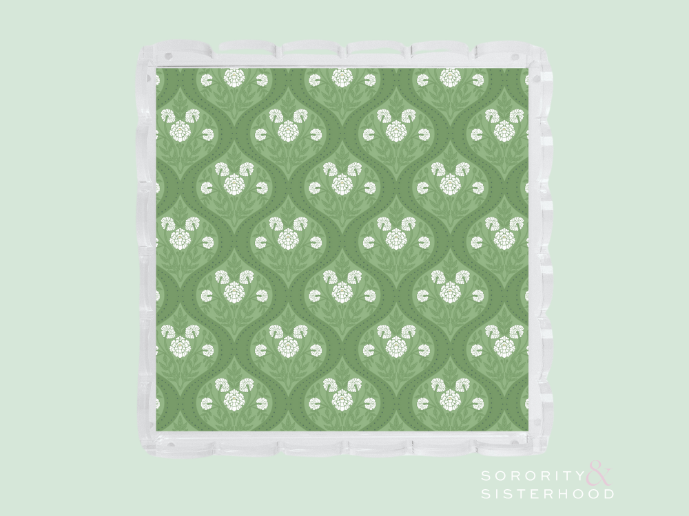 Green acrylic tray with white scalloped edges and a repeating white floral pattern.