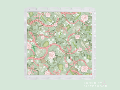 Square acrylic tray with scalloped edges, decorated with pink pearls and green floral pattern.