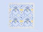Square acrylic tray with scalloped edges, blue and yellow floral and butterfly pattern.