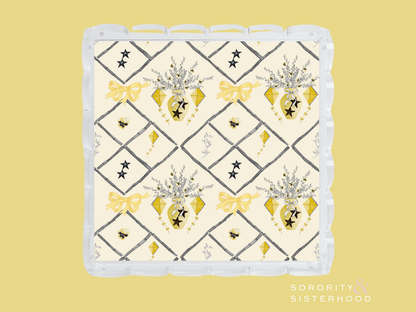Square ceramic tray with scalloped edges, cream background, gold hearts, bows, and black diamond pattern.