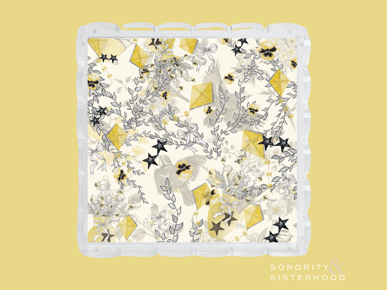 White tray with scalloped edges decorated with gold and black Kappa Alpha Theta sorority symbols and floral accents.