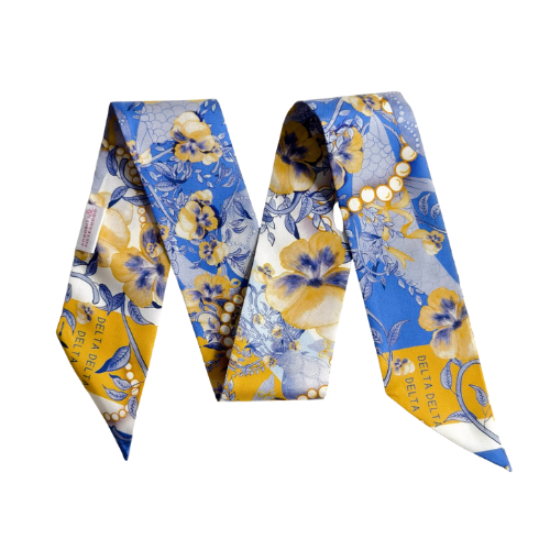 Blue and yellow floral patterned silk scarflette with gold accents and pointed ends.
