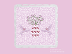 Lavender scalloped tray with white damask pattern and Sigma Kappa emblem in center.