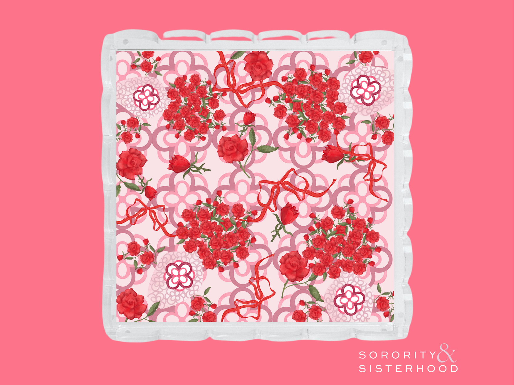 Acrylic tray with scalloped edges featuring red and pink floral and swirl patterns.