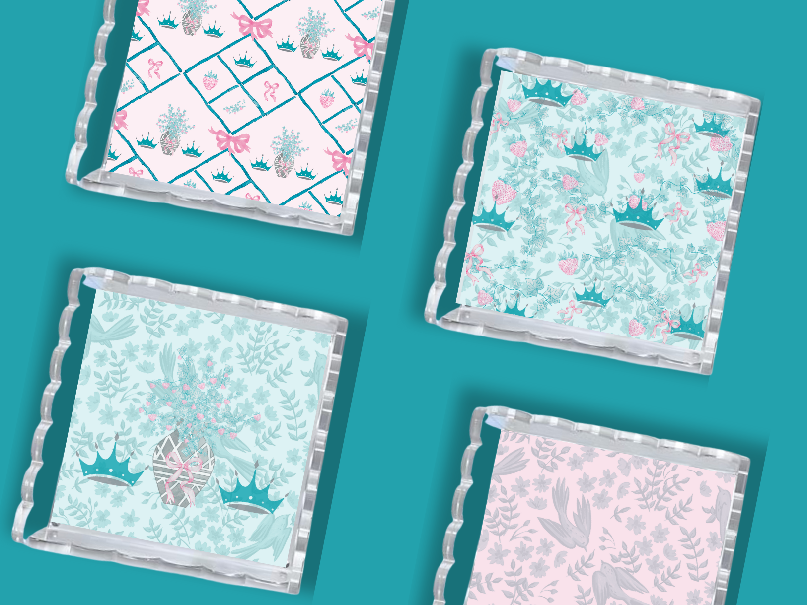 Set of three acrylic trays with scalloped edges, featuring pastel pink and teal floral and crown patterns.